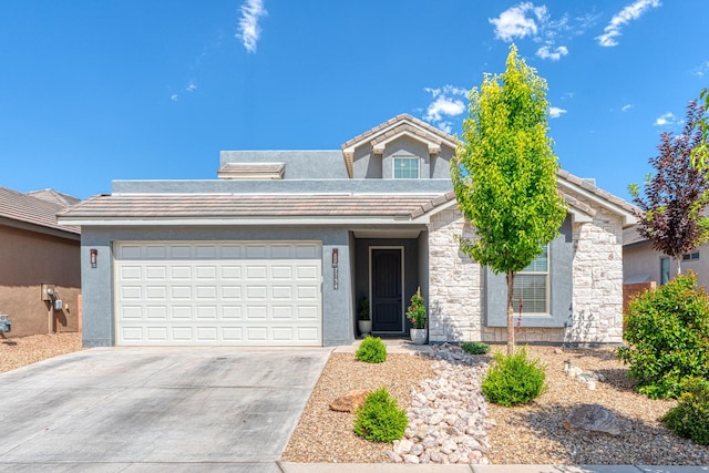 7754 Majesty Ct NW, Albuquerque, NM 87107 - view of front of house with driveway, a tile roof, an attached garage, stucco siding, and stone siding
