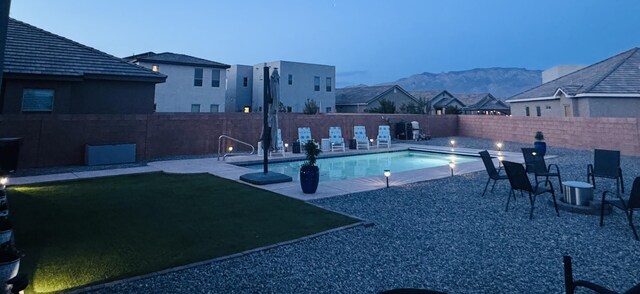 7754 Majesty Ct NW, Albuquerque, NM 87107 - view of pool with a fenced backyard, a patio area, a mountain view, and a residential view