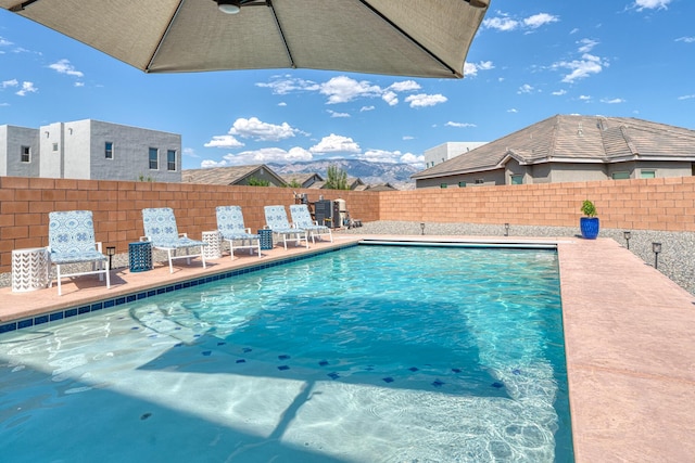 7754 Majesty Ct NW, Albuquerque, NM 87107 - view of swimming pool with a fenced backyard and a patio