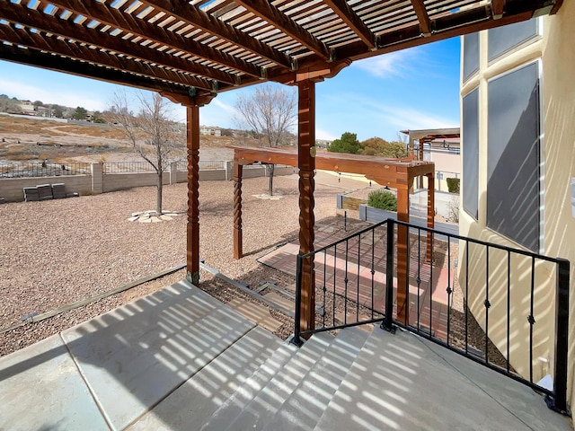 view of patio / terrace featuring a pergola and a fenced backyard