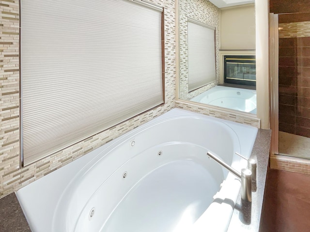 bathroom featuring a whirlpool tub
