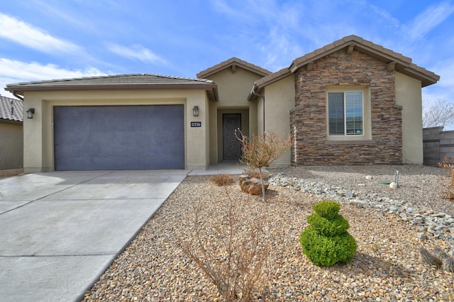 12136 Bear Valley Ln NW, Albuquerque, NM 87120 - view of front of house featuring stone siding, concrete driveway, an attached garage, stucco siding, and a tiled roof