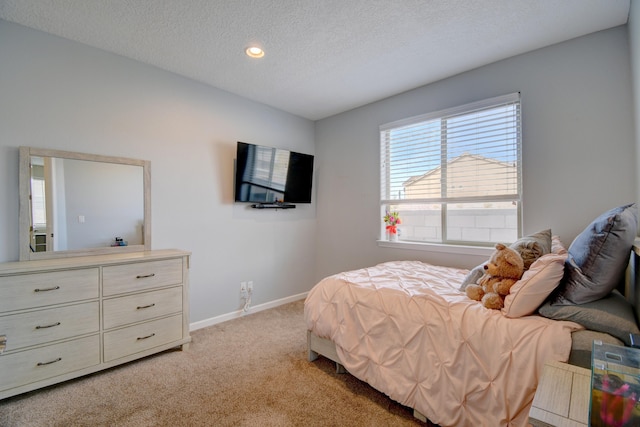 12136 Bear Valley Ln NW, Albuquerque, NM 87120 - bedroom with light colored carpet, baseboards, a textured ceiling, and recessed lighting