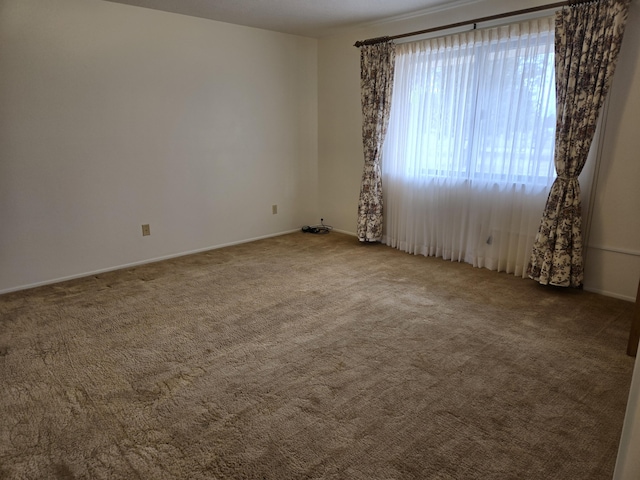 view of carpeted spare room