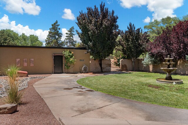 240 E Valverde Rd, Corrales, NM 87048 - view of yard with a patio