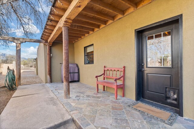 240 E Valverde Rd, Corrales, NM 87048 - view of side of home featuring stucco siding