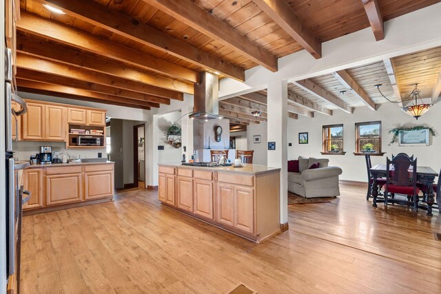 240 E Valverde Rd, Corrales, NM 87048 - kitchen featuring brown cabinets and light stone counters