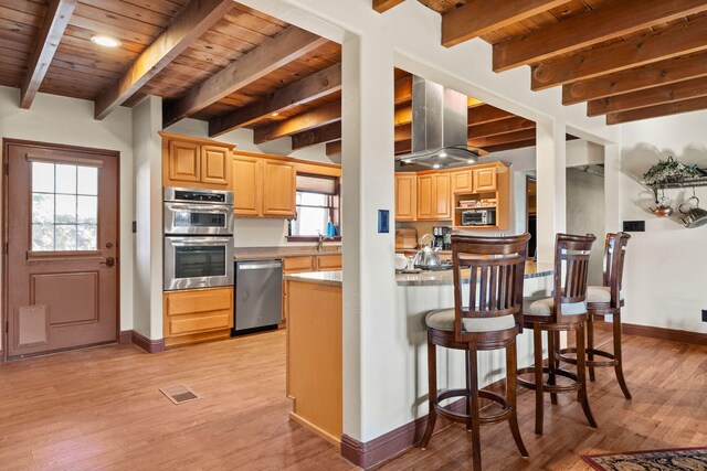 240 E Valverde Rd, Corrales, NM 87048 - kitchen with light brown cabinetry, open floor plan, a wood ceiling with exposed beams, light wood-style flooring, and light countertops