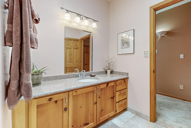 712 Navarra Way SE, Albuquerque, NM 87123 - bathroom featuring vanity and baseboards