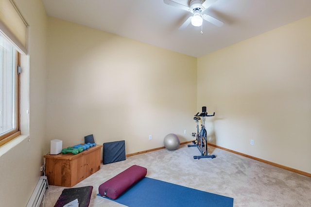 712 Navarra Way SE, Albuquerque, NM 87123 - workout area with a baseboard radiator, ceiling fan, carpet floors, and baseboards