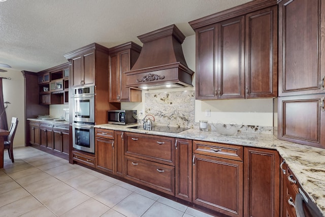 kitchen with open shelves, appliances with stainless steel finishes, a textured ceiling, premium range hood, and tasteful backsplash