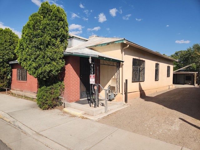912 Camino Del Pueblo, Bernalillo, NM 87004 - view of front of house with stucco siding