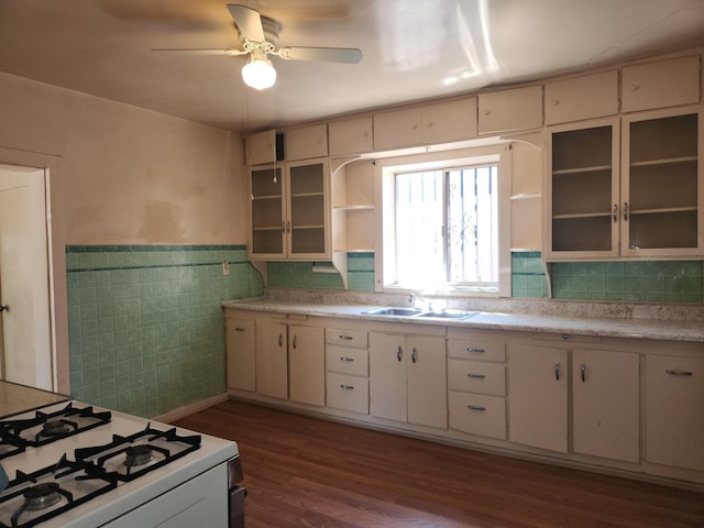 912 Camino Del Pueblo, Bernalillo, NM 87004 - kitchen featuring light countertops, white range with gas cooktop, dark wood-style floors, a ceiling fan, and open shelves