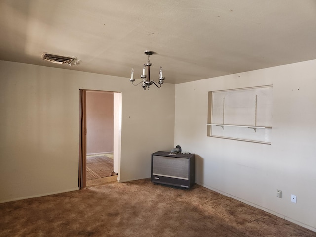 912 Camino Del Pueblo, Bernalillo, NM 87004 - spare room with an inviting chandelier, visible vents, and carpet floors