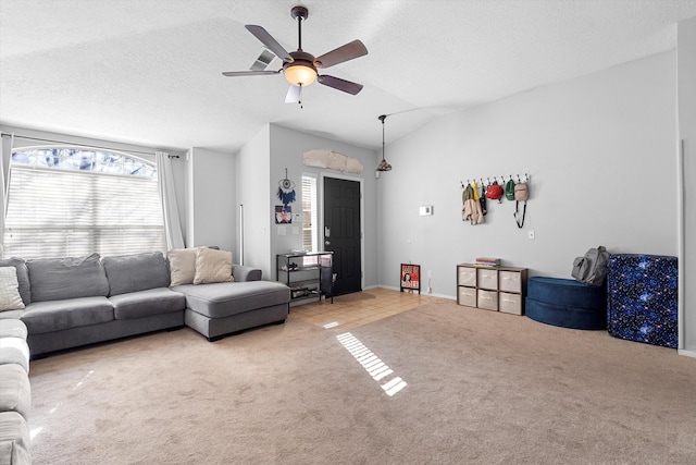 9405 Vervain Dr NW, Albuquerque, NM 87114 - living room featuring a textured ceiling, ceiling fan, lofted ceiling, and carpet