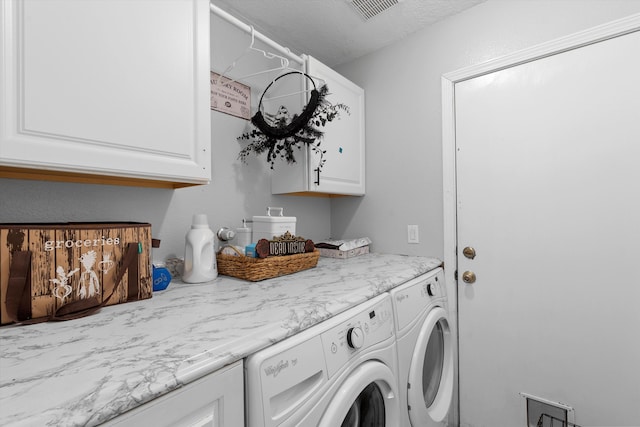 9405 Vervain Dr NW, Albuquerque, NM 87114 - laundry room with cabinet space, visible vents, and independent washer and dryer