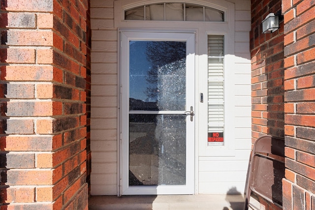 9405 Vervain Dr NW, Albuquerque, NM 87114 - view of exterior entry with brick siding