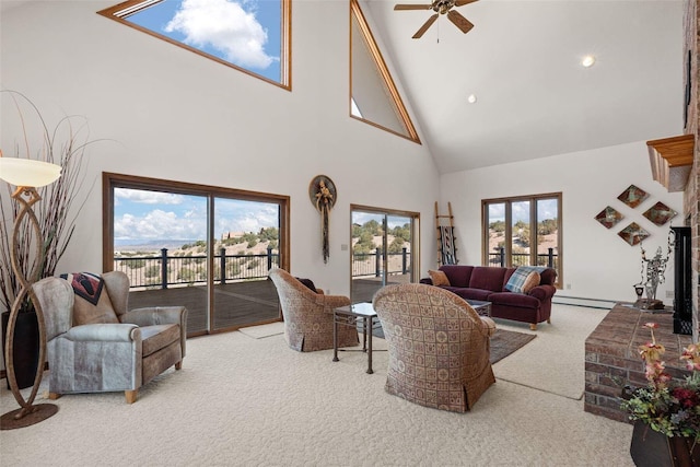 carpeted living area featuring a baseboard radiator, high vaulted ceiling, and a ceiling fan