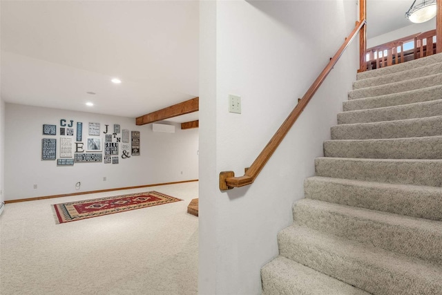 stairway with recessed lighting, baseboards, and carpet floors