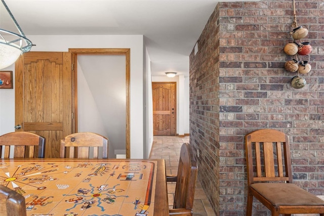 dining room featuring stone tile flooring
