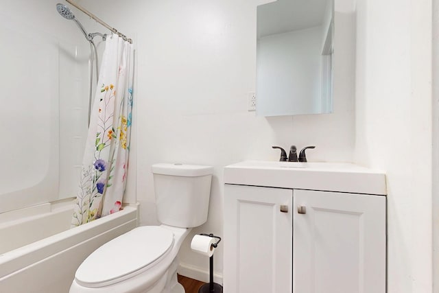 bathroom with toilet, vanity, and shower / tub combo with curtain