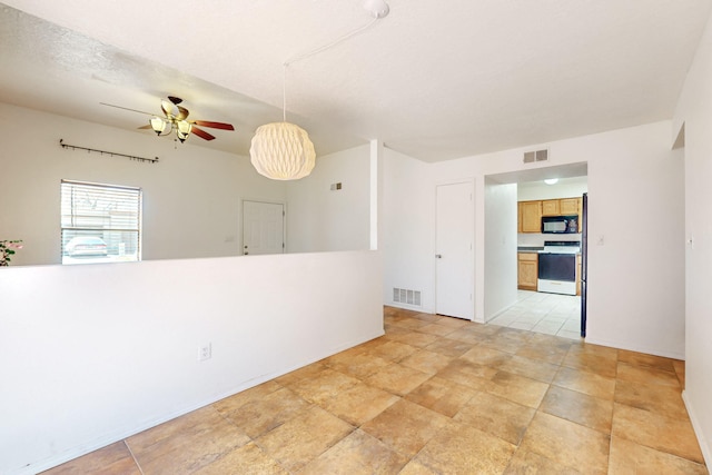 6817 Armand Rd NW, Albuquerque, NM 87120 - unfurnished room with visible vents and ceiling fan