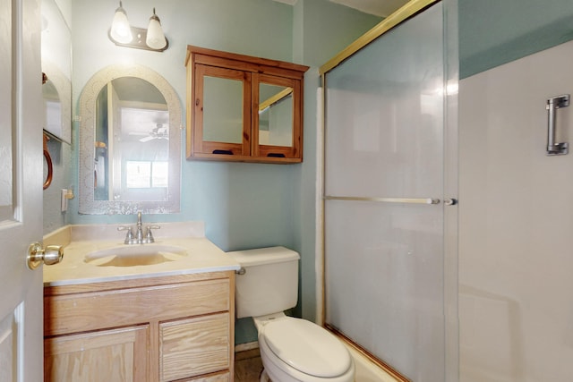 6817 Armand Rd NW, Albuquerque, NM 87120 - full bathroom featuring vanity, toilet, and a stall shower