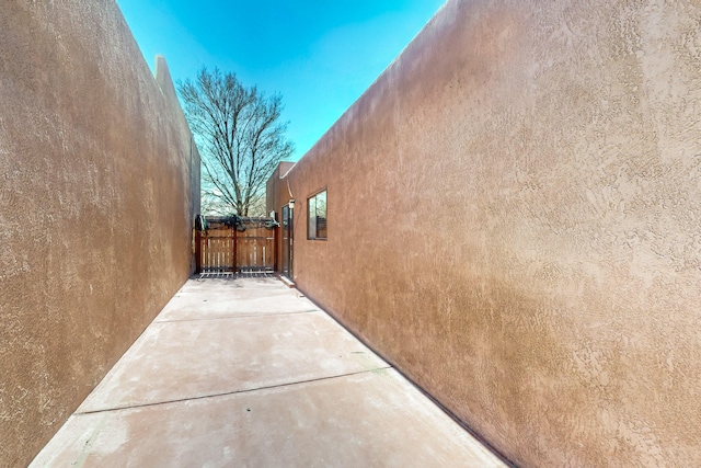 6817 Armand Rd NW, Albuquerque, NM 87120 - view of home's exterior featuring fence and stucco siding