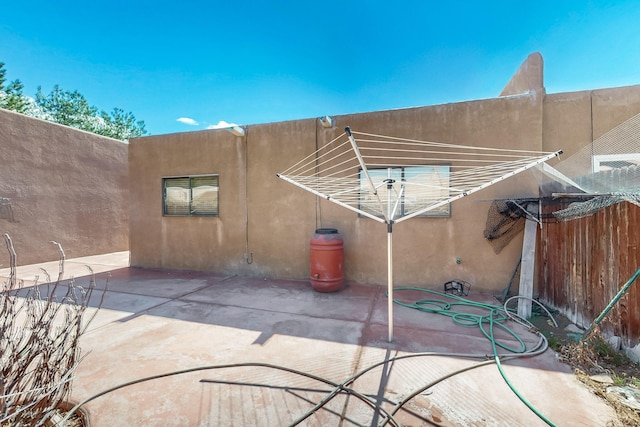 6817 Armand Rd NW, Albuquerque, NM 87120 - view of patio / terrace with fence