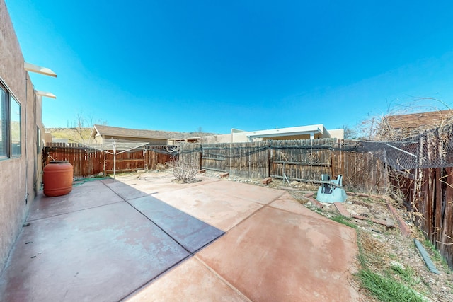 6817 Armand Rd NW, Albuquerque, NM 87120 - view of patio featuring a fenced backyard