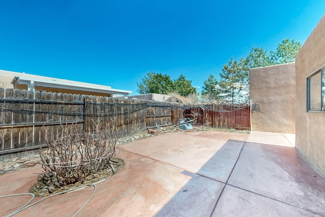 6817 Armand Rd NW, Albuquerque, NM 87120 - view of patio / terrace featuring a fenced backyard