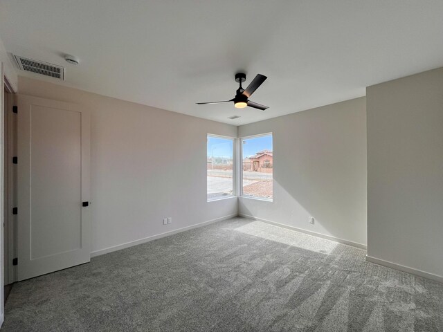 7908 Emerald Dr NW, Albuquerque, NM 87120 - carpeted empty room featuring visible vents, baseboards, and a ceiling fan