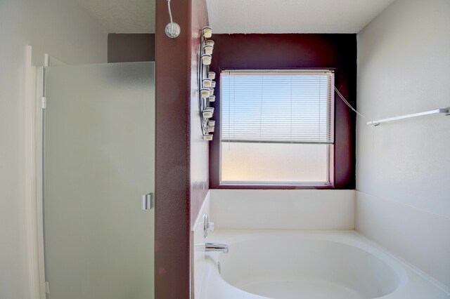 5750 Quay St, Rio Rancho, NM 87144 - full bathroom with a bath and a stall shower