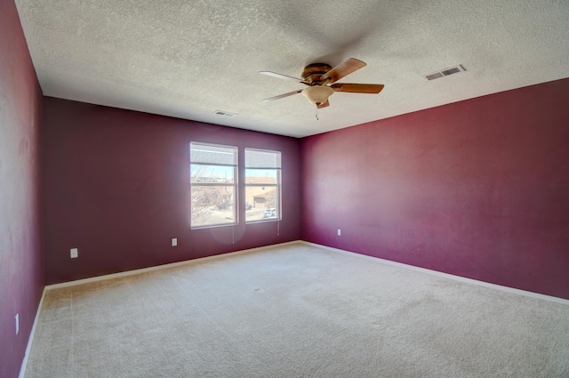 5750 Quay St, Rio Rancho, NM 87144 - empty room featuring visible vents, carpet flooring, baseboards, and a ceiling fan