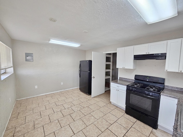 kitchen featuring dark countertops, under cabinet range hood, white cabinetry, and black appliances