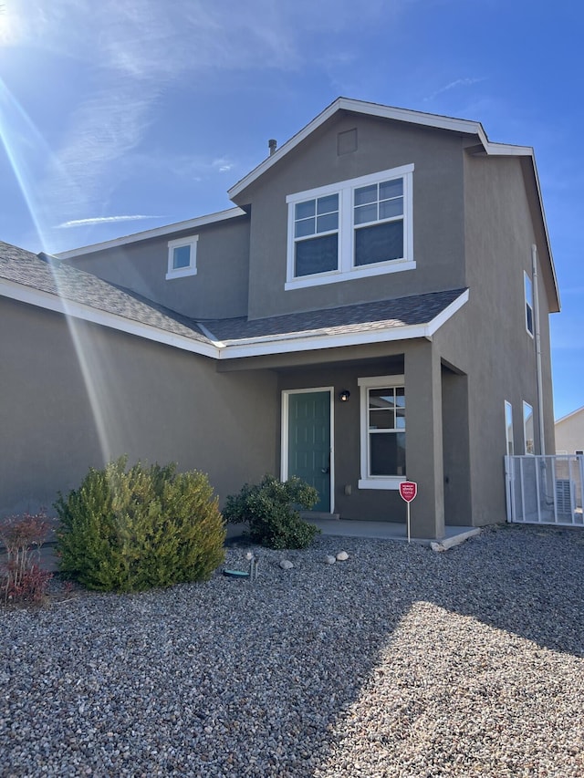 6204 Corte Alzira NW, Albuquerque, NM 87114 - traditional-style house with stucco siding and covered porch