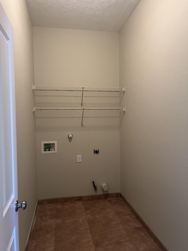 6204 Corte Alzira NW, Albuquerque, NM 87114 - clothes washing area with laundry area, hookup for a washing machine, hookup for an electric dryer, hookup for a gas dryer, and baseboards