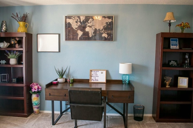 office area with baseboards and carpet flooring