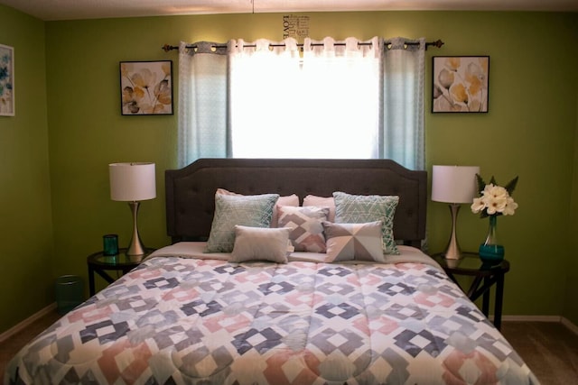bedroom featuring baseboards