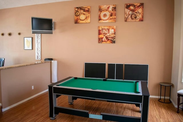 game room featuring baseboards, wood finished floors, and pool table