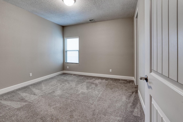 1954 Castle Peak Loop NE, Rio Rancho, NM 87144 - empty room featuring carpet flooring and a textured ceiling