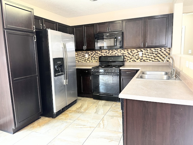 131 Las Ramblas Ave NW, Rio Rancho, NM 87144 - kitchen featuring black appliances, a sink, light countertops, and backsplash