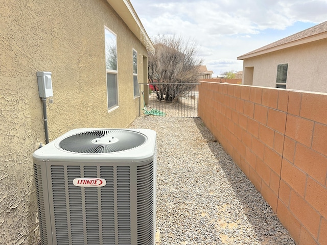 131 Las Ramblas Ave NW, Rio Rancho, NM 87144 - exterior view of cooling unit and stucco siding