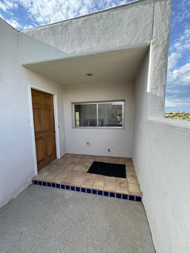 6488 Tahawash St, Cochiti Lake, NM 87083 - property entrance with stucco siding