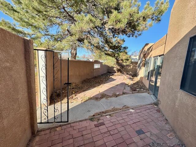 701 Houston Ave, Grants, NM 87020 - view of patio with a fenced backyard