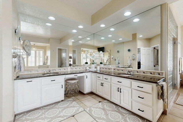 6404 Oak Hill NE, Albuquerque, NM 87111 - full bath with a notable chandelier, vanity, and recessed lighting