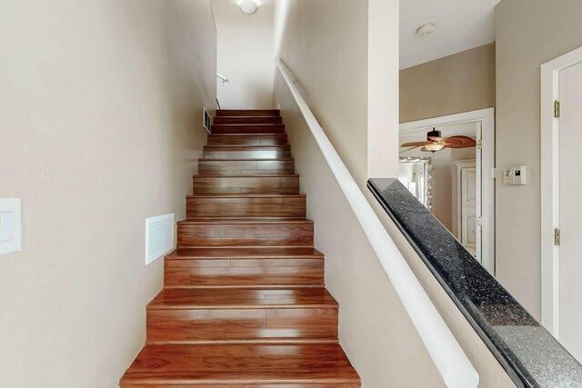 6404 Oak Hill NE, Albuquerque, NM 87111 - stairway featuring visible vents and ceiling fan