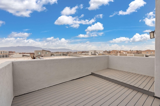 2422 Lynn Rd SE, Rio Rancho, NM 87124 - wooden deck featuring a residential view and a mountain view