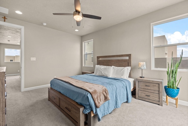 2422 Lynn Rd SE, Rio Rancho, NM 87124 - bedroom with baseboards, carpet flooring, a ceiling fan, and recessed lighting