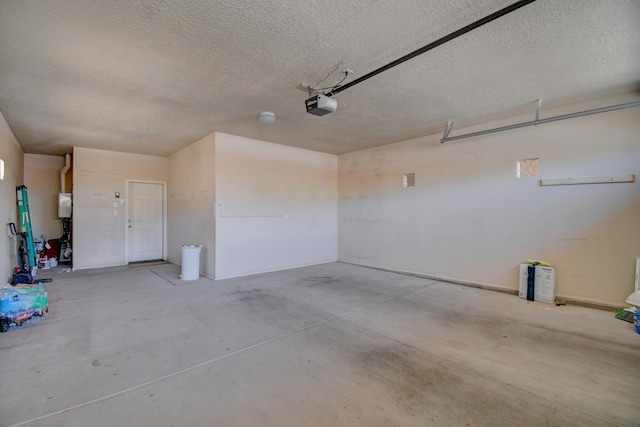 10916 Calandrias St NW, Albuquerque, NM 87114 - garage featuring a garage door opener